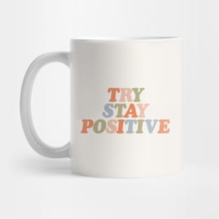 Try Stay Positive by The Motivated Type in soft orange pink green and pastel blue Mug